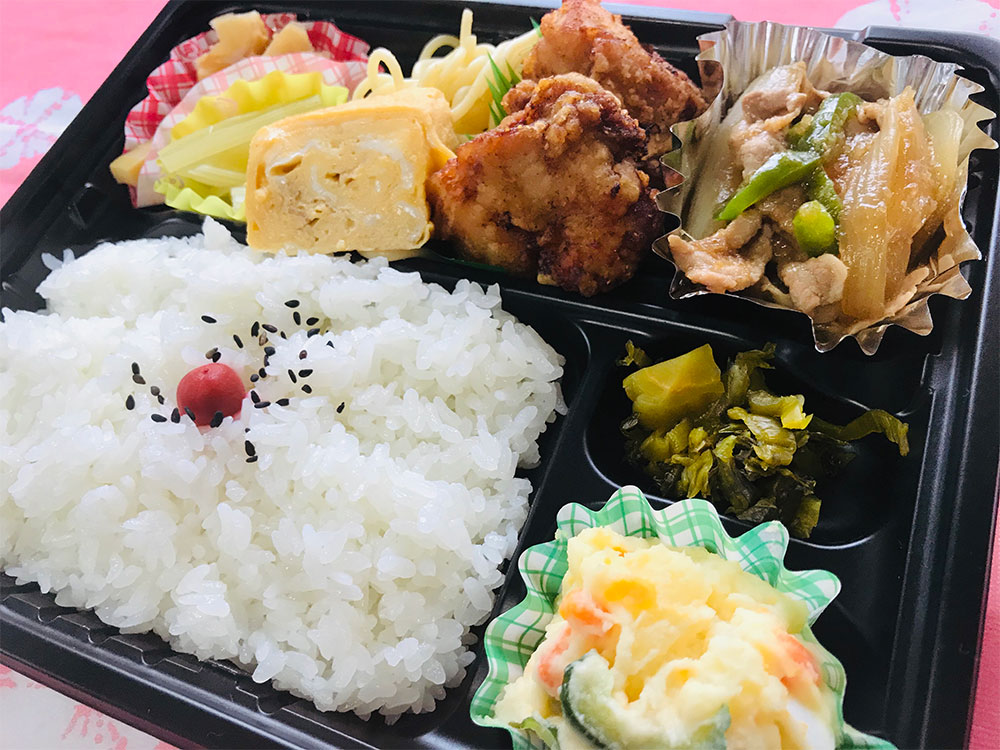 コンビ弁当(唐揚げ・生姜焼き)